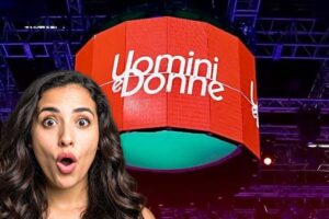 logo uomini e donne con donna stupita